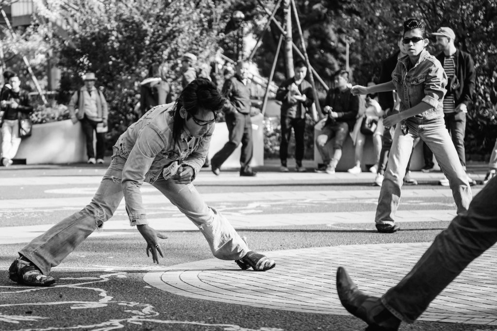 men dressed in rockabilly style dance in Yoyogi Park