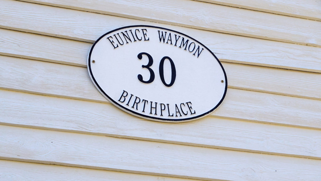 the address plate at the childhood home of Nina Simone reads the number 30 and "Eunice Waymon Birthplace"
