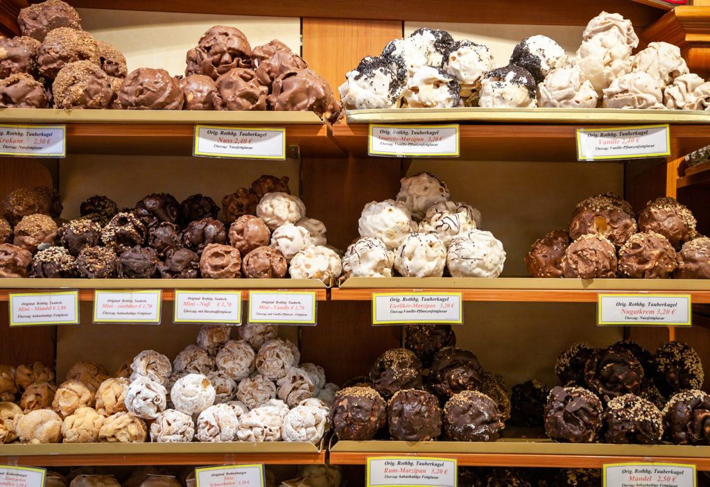 shelves of the popular sweet treat from Rothenburg, Germany called Schneeballen