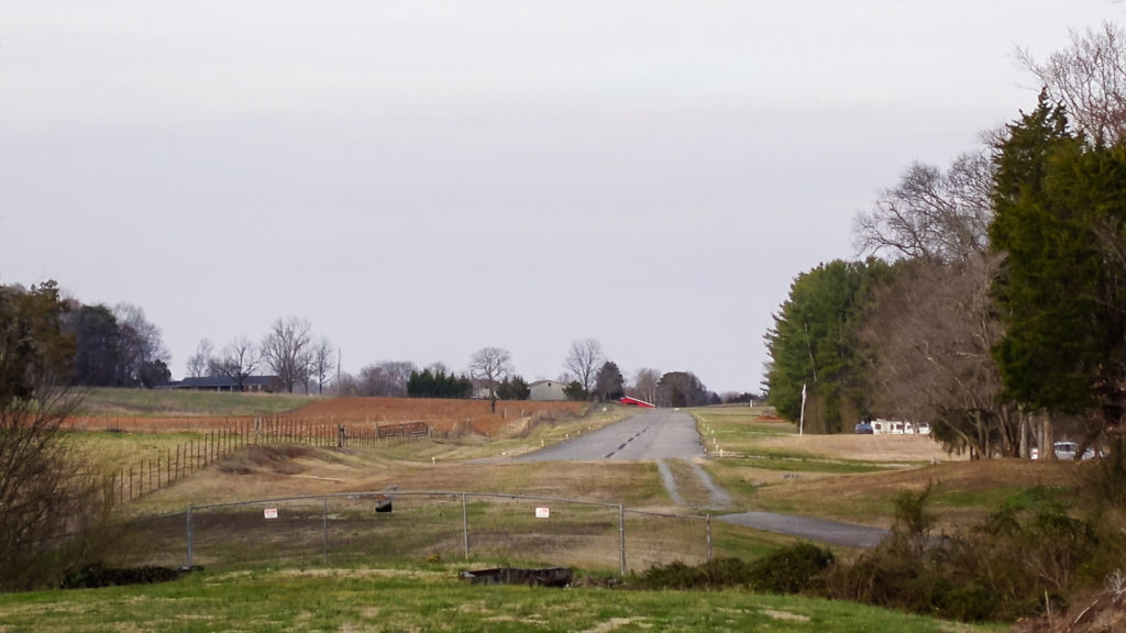a small, private airstrip in a field