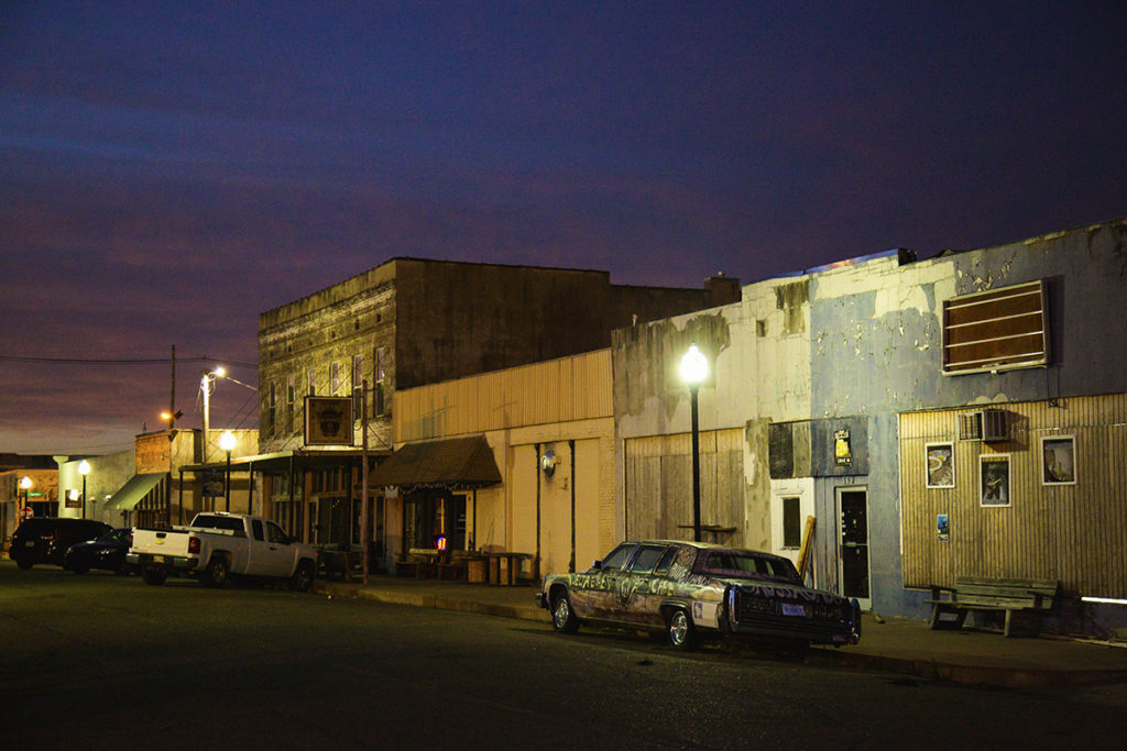 a street in Clarksdale, Mississippi at night
