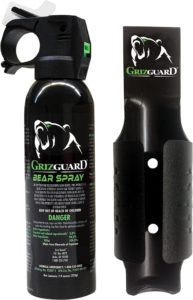 a Can of GrizGuard bear spray with holster.