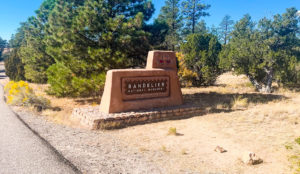 Bandelier National Monument sign at the entrance of the park
