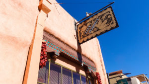 the sign on the outside of Cafe Pasqual's in Santa Fe, New Mexico