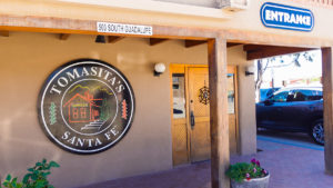 sign on the outside of Tomasita's restaurant in Santa Fe, New Mexico